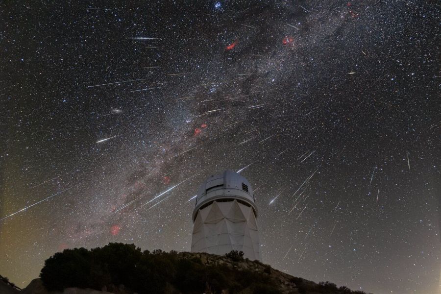 DESI observes the sky from the Mayall Telescope, shown here during the 2023 Geminid meteor shower. Credit: KPNO/NOIRLab/NSF/AURA/R. Sparks
