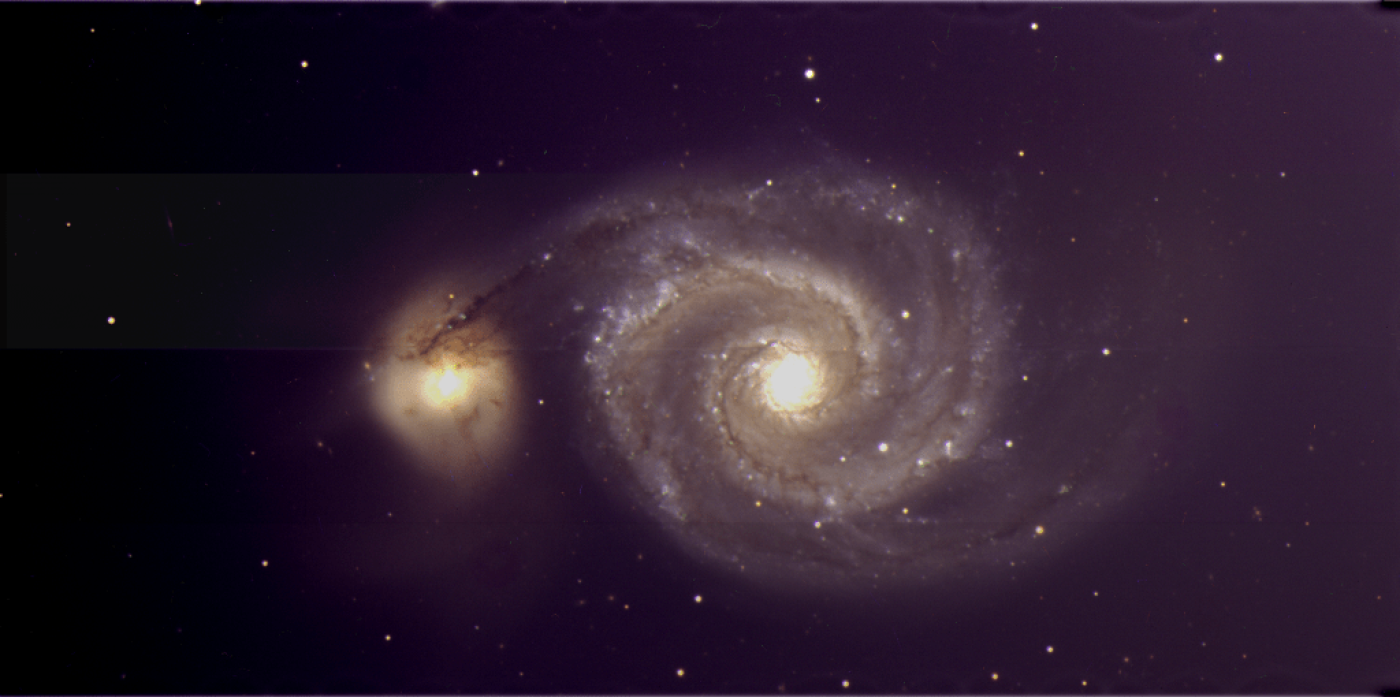 Galaxies merging.