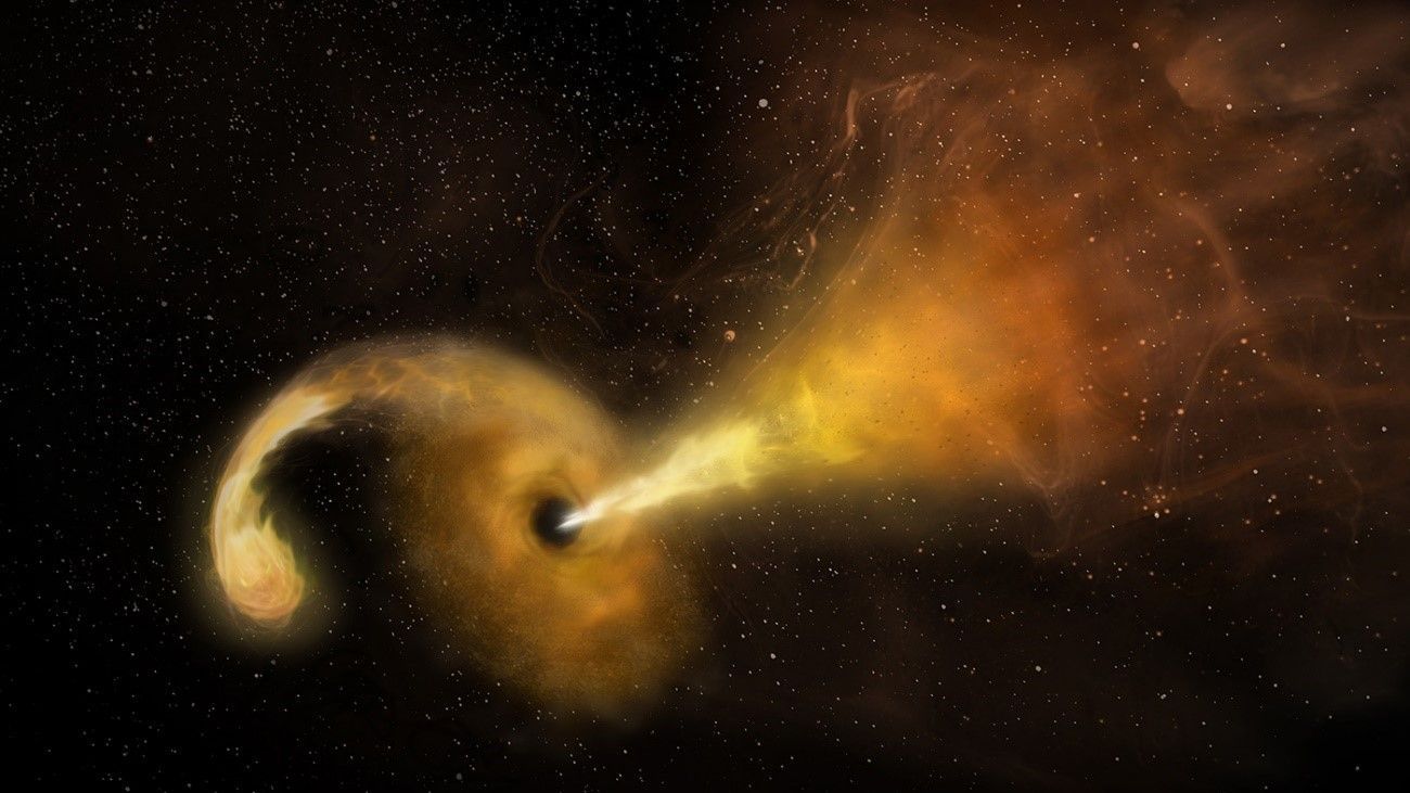 Artist's conception of the disruption of a star by a supermassive black hole. / Sophia Dagnello
