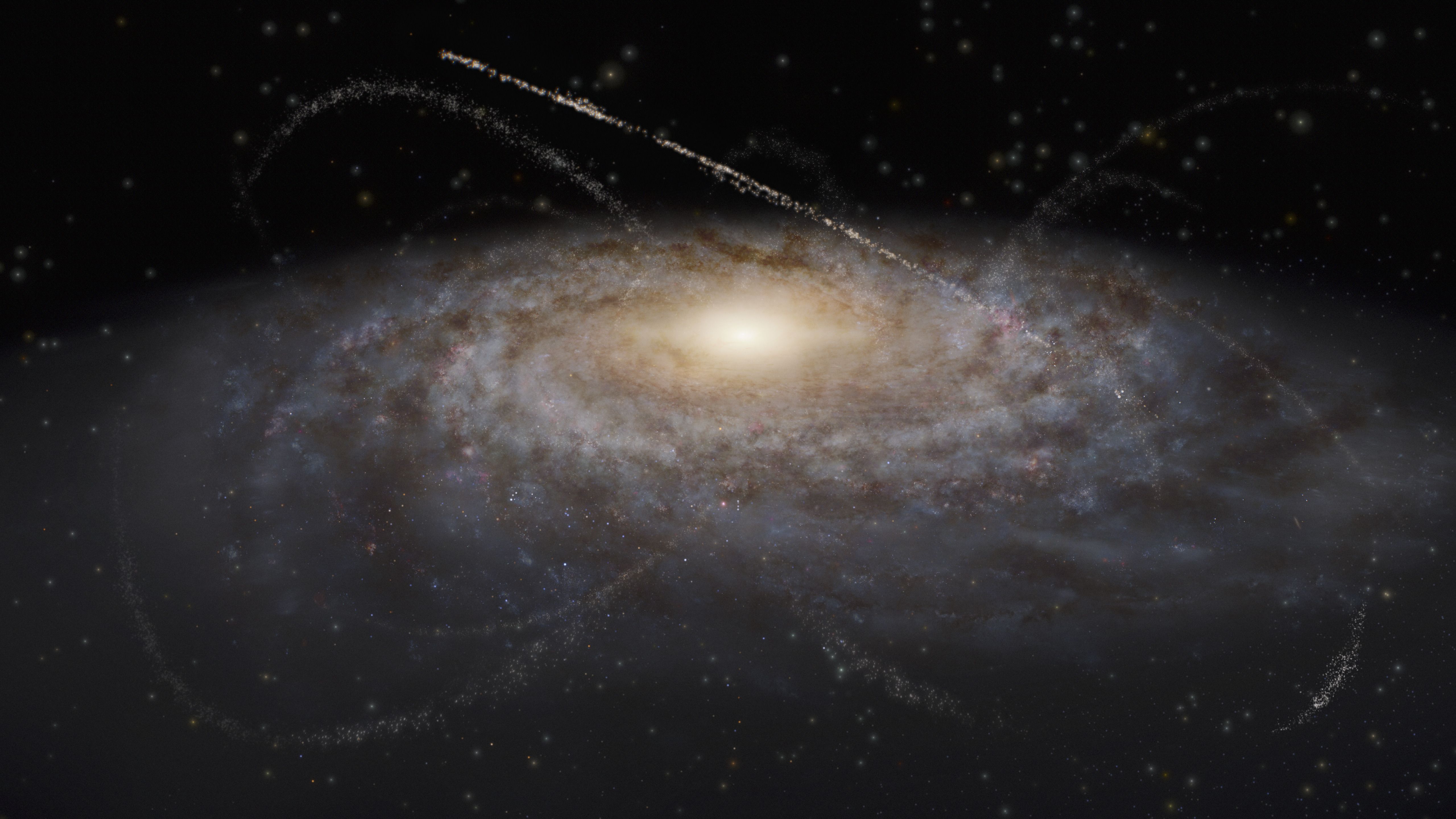 This artist’s impression shows a myriad of stellar streams in and around the Milky Way. These stretched-out remnants of dwarf galaxies and star clusters showcase gravitational interactions between stars, clumps of dark matter, and the entire galaxy. Rubin Observatory will reveal many more stellar streams than we have seen thus far, enabling scientists to study our galaxy’s history and properties of dark matter in more detail than ever before. RubinObs/NOIRLab/NSF/AURA/J. daSilva, M. Zamani