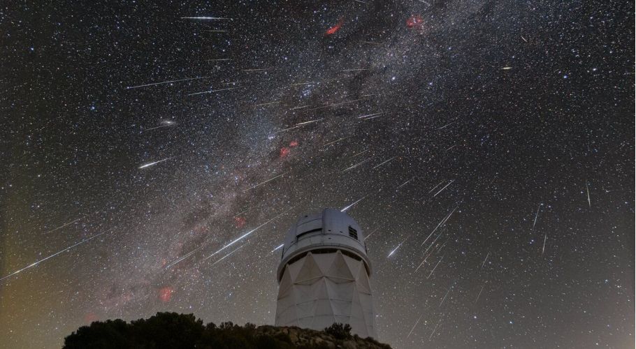 DESI observes the sky from the Mayall Telescope, shown here during the 2023 Geminid meteor shower.  Credit: KPNO/NOIRLab/NSF/AURA/R. Sparks.